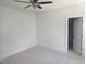 An inviting bedroom with neutral carpet, a ceiling fan, and freshly painted walls at 15 Independence Dr, Smithfield, NC 27577