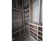 Walk-in closet with custom shelving and drawers for optimal storage at 15 Independence Dr, Smithfield, NC 27577