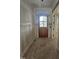 Inviting foyer featuring an arched door and views of the landscaped yard at 15 Independence Dr, Smithfield, NC 27577