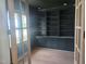 A home office featuring custom built-in shelving and storage, perfect for a productive workspace at 15 Independence Dr, Smithfield, NC 27577