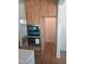 Close up of a kitchen appliance cabinet with a door open to reveal a walk-in pantry at 15 Independence Dr, Smithfield, NC 27577