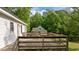 Spacious wooden deck perfect for entertaining or relaxing outdoors at 160 Fox Run Rd, Youngsville, NC 27596