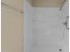 Close up of a clean and modern bathroom shower, featuring shelves and a shower head at 160 Fox Run Rd, Youngsville, NC 27596