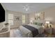 Comfortable bedroom with a plush bed, stylish decor, and ample natural light from the windows at 160 Fox Run Rd, Youngsville, NC 27596