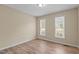 Bedroom with neutral walls, and hardwood flooring at 160 Fox Run Rd, Youngsville, NC 27596