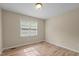Bedroom with neutral walls and hardwood flooring at 160 Fox Run Rd, Youngsville, NC 27596