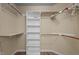 Organized walk-in closet featuring shelving, rods, and plenty of storage space at 160 Fox Run Rd, Youngsville, NC 27596