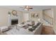 Cozy living room with fireplace, modern furniture, and ample natural light at 160 Fox Run Rd, Youngsville, NC 27596