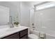 Bathroom with single vanity and a shower-tub combo at 162 W Lumber Ct, Clayton, NC 27520