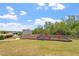 Vibrant community playground featuring colorful slides, swings, and benches nestled in a grassy area at 162 W Lumber Ct, Clayton, NC 27520