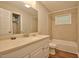 Bathroom features a modern vanity, sink, tub and shower at 1708 S Alston Ave, Durham, NC 27707
