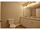 Bathroom with double vanity, granite countertop, and walk-in shower at 1708 S Alston Ave, Durham, NC 27707
