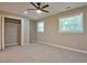 Spacious bedroom with a closet, ceiling fan, and lots of natural light at 1708 S Alston Ave, Durham, NC 27707