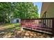 Wooden deck overlooking the backyard and a view of a shed at 1708 S Alston Ave, Durham, NC 27707