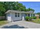 Exterior of home featuring stone facade, vinyl siding and green foliage at 1708 S Alston Ave, Durham, NC 27707