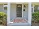 Close-up of the front door with address, showcasing a charming tiled landing and a welcoming entrance at 1708 S Alston Ave, Durham, NC 27707