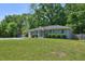Ranch home with a covered porch and expansive green front yard at 1708 S Alston Ave, Durham, NC 27707
