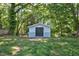 A backyard shed with a double door entrance at 1708 S Alston Ave, Durham, NC 27707