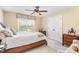 Bright bedroom with a large window, a comfortable bed, and a double door closet at 1710 Eddy Ct, Franklinton, NC 27525