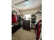 Walk-in closet featuring custom shelving, drawers, and ample hanging space at 1710 Eddy Ct, Franklinton, NC 27525