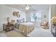 Bright bedroom with a tray ceiling, plush carpet, and a comfortable bed with stylish bedding at 19 Sangre De Cristo Dr, Durham, NC 27705