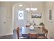 Bright dining room with stylish lighting and decorative accents at 19 Sangre De Cristo Dr, Durham, NC 27705