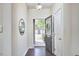Open entryway with hardwood floors and view to home exterior at 19 Sangre De Cristo Dr, Durham, NC 27705