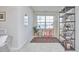 Bright home office space with a desk, shelving, and plenty of natural light at 19 Sangre De Cristo Dr, Durham, NC 27705