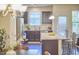 The kitchen features stainless steel appliances, granite countertops, and a breakfast bar, ideal for casual dining and meal preparation at 19 Sangre De Cristo Dr, Durham, NC 27705