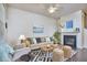 Charming living room featuring hardwood floors, a fireplace, and stylish decor, creating a warm and inviting atmosphere at 19 Sangre De Cristo Dr, Durham, NC 27705