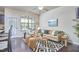 Cozy living room features contemporary decor, hardwood floors, fireplace, and ample natural light, perfect for relaxation at 19 Sangre De Cristo Dr, Durham, NC 27705