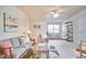 Cozy living room area with plush seating, a decorative rug, and natural light at 19 Sangre De Cristo Dr, Durham, NC 27705