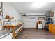 Basement work area with a sink, storage, and ample space for projects at 202 Homestead Dr, Cary, NC 27513