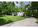 Charming two-story home features a well-manicured lawn and inviting curb appeal at 202 Homestead Dr, Cary, NC 27513
