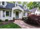 Inviting front entrance with a stone walkway and stylish front door at 202 Homestead Dr, Cary, NC 27513