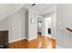 Second floor hallway with hardwood floors; view of Bedroom and bathroom at 202 Homestead Dr, Cary, NC 27513