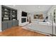 Inviting living room with custom built-ins, fireplace, and comfortable seating at 202 Homestead Dr, Cary, NC 27513