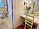 Bathroom with an adjacent vanity area, complemented by bright natural light and vintage charm at 204 N Elliott Rd, Chapel Hill, NC 27514