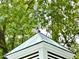 Close-up of the cupola with a weather vane on top of the home at 204 N Elliott Rd, Chapel Hill, NC 27514