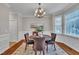Elegant dining room with hardwood floors and a chandelier at 206 Wagon Trail Dr, Cary, NC 27513