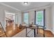 Well-lit office featuring hardwood floors and large windows at 206 Wagon Trail Dr, Cary, NC 27513