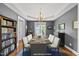 Elegant dining room with a large table, chandelier, and ample seating at 209 Brookberry Rd, Holly Springs, NC 27540