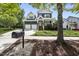 Charming two-story home with a well-maintained front yard and a two-car garage at 209 Brookberry Rd, Holly Springs, NC 27540