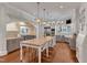 Gourmet kitchen with custom cabinets, a large center island, professional appliances, and hardwood floors at 2117 Buckingham Rd, Raleigh, NC 27607