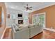 Cozy living room features a fireplace, custom built-ins, hardwood floors, and neutral paint at 2117 Buckingham Rd, Raleigh, NC 27607