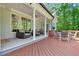 Inviting back porch with seating areas, perfect for relaxing and entertaining at 2201 Avinshire Pl, Wake Forest, NC 27587