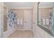 Bathroom showing shower and tub, with soft colors and coordinated décor for relaxation at 2201 Avinshire Pl, Wake Forest, NC 27587