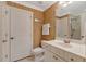 Bathroom with white vanity, toilet, and framed mirror at 2201 Avinshire Pl, Wake Forest, NC 27587