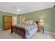 Inviting bedroom with a comfortable bed, natural light, and a calming color scheme for relaxation at 2201 Avinshire Pl, Wake Forest, NC 27587