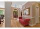 Grand entryway features a light-filled foyer, hardwood floors, and a decorative bench at 2201 Avinshire Pl, Wake Forest, NC 27587